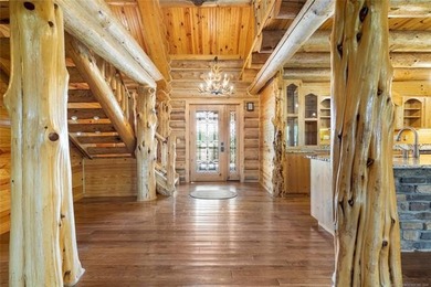 This meticulous, custom log home is high quality in design - photo 7