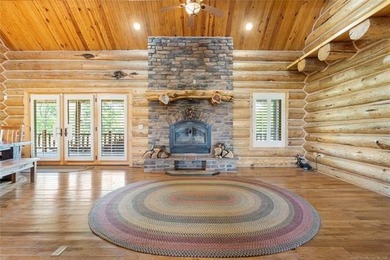 This meticulous, custom log home is high quality in design - photo 8