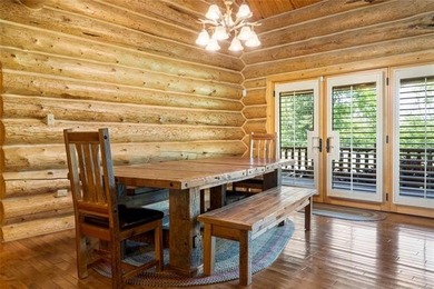 This meticulous, custom log home is high quality in design - photo 9