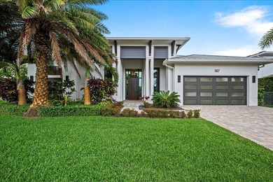Welcome to an exceptional coastal retreat, where modern luxury - photo 1