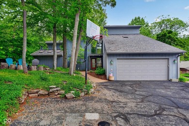 Tucked among mature trees in the highly sought-after South - photo 2