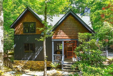 Experience unparalleled mountain living in this charming - photo 2