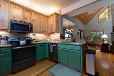 Experience unparalleled mountain living in this charming - photo 8