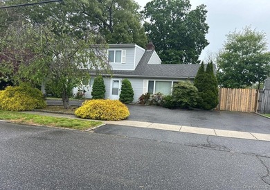 This Expanded Cape Style Home Features 4 Bedrooms, 2 Full Baths - photo 3