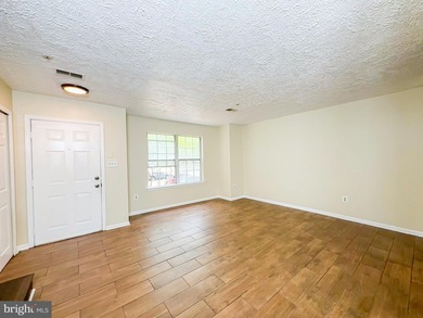 Welcome to 7218 Unit #4! This bright and updated home features a - photo 3