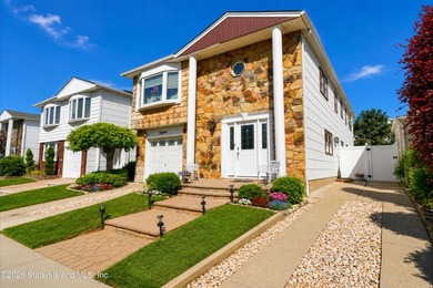Welcome to this spacious and beautifully maintained two-family - photo 3