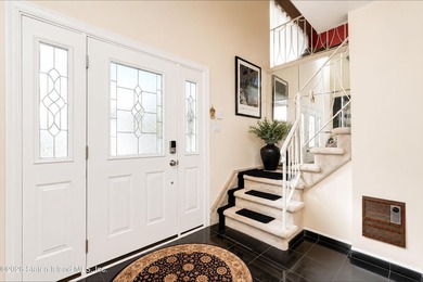 Welcome to this spacious and beautifully maintained two-family - photo 4