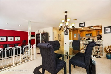Welcome to this spacious and beautifully maintained two-family - photo 9