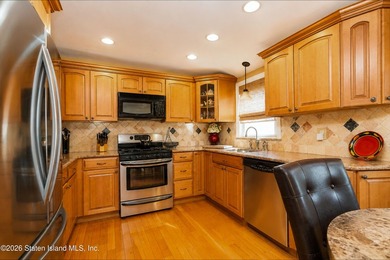 Welcome to this spacious and beautifully maintained two-family - photo 10