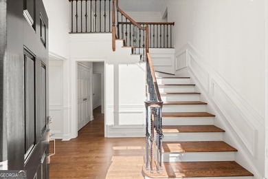 DO NOT MISS this Brick Beauty in coveted Hampton Woods with a - photo 2