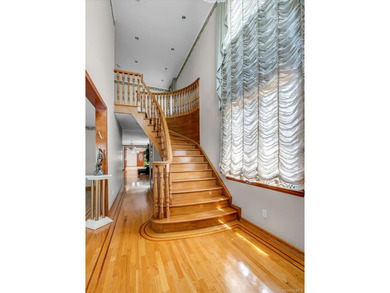 Welcome to your new home. This magnificent custom-built brick - photo 3