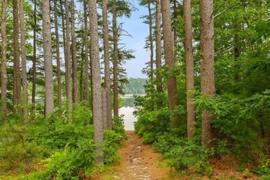 Overlooking Tihonet Pond, 22 Red Pine Lane offers a distinctive - photo 7