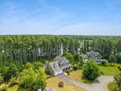 Overlooking Tihonet Pond, 22 Red Pine Lane offers a distinctive - photo 10