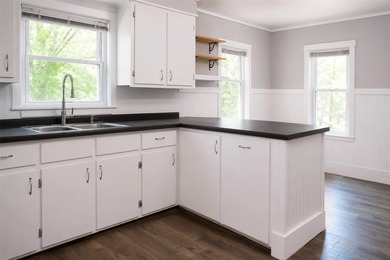 This updated home is move-in ready with fresh flooring, paint - photo 6
