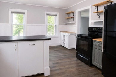 This updated home is move-in ready with fresh flooring, paint - photo 7