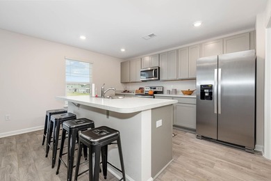 Welcome to The Meadows at Wildwood Village. Residents will enjoy - photo 9