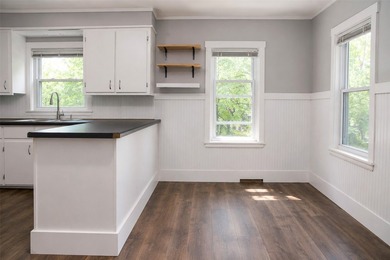 This updated home is move-in ready with fresh flooring, paint - photo 10