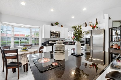 Welcome to a beautifully reimagined lakefront Turnkey home. This - photo 4