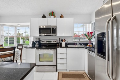 Welcome to a beautifully reimagined lakefront Turnkey home. This - photo 8