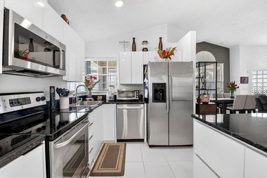Welcome to a beautifully reimagined lakefront Turnkey home. This - photo 9