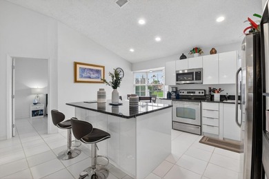 Welcome to a beautifully reimagined lakefront Turnkey home. This - photo 10