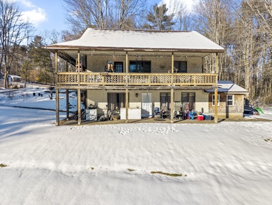 Set on a peaceful 3.3-acre parcel, this unique property offers