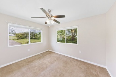 Nestled on a landscaped 1-acre lot, located just off Makuu Dr in - photo 16