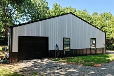 LOCATED IN THE HEART OF LONGTOWN, this like-new barndominium - photo 7