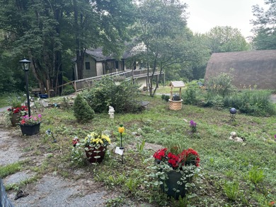 Set on a peaceful 3.3-acre parcel, this unique property offers