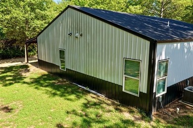 LOCATED IN THE HEART OF LONGTOWN, this like-new barndominium - photo 9