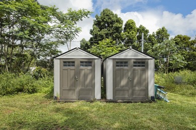 Nestled on a landscaped 1-acre lot, located just off Makuu Dr in - photo 25