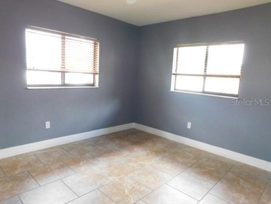 Nice 3/2 with formal living room with sliders leading to back - photo 2