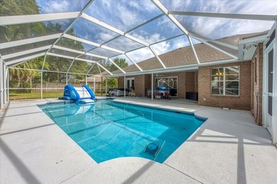Welcome to Rocky Bayou Country Club Estates. This home offers a - photo 1