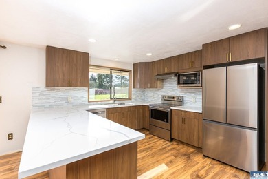 Set on 1.3 acres with beautiful mountain views, this property - photo 24