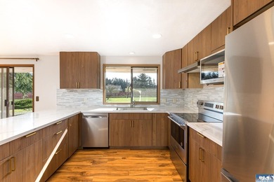 Set on 1.3 acres with beautiful mountain views, this property - photo 25
