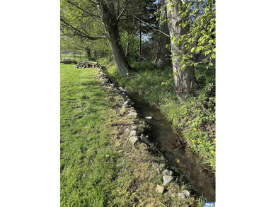 Set on 1.3 acres with beautiful mountain views, this property - photo 33