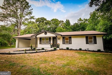 Beautifully renovated 3-bedroom, 2-bath brick ranch on nearly - photo 1