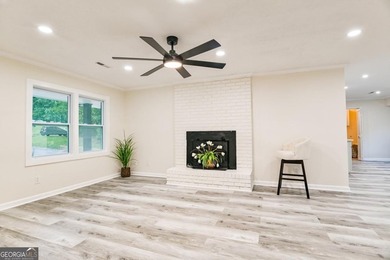 Beautifully renovated 3-bedroom, 2-bath brick ranch on nearly - photo 10