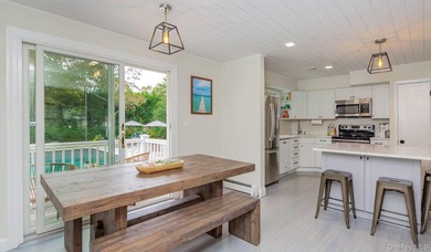 Indoor-Outdoor Living in Hampton Bays Situated south of the - photo 16