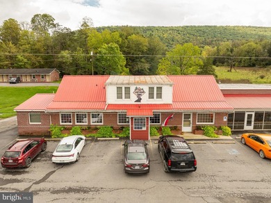 We are excited to present the Lost River Grill and Motel and - photo 3