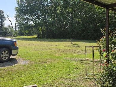 Clean well kept single wide mobile home with metal roof. Along - photo 4