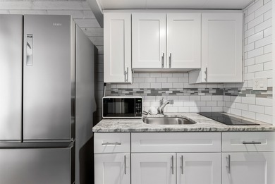 THIS IS IT! Turn key, beach block, 1 bedroom 1 bath condo with 2