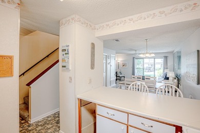 Tucked away in the highly sought after West End of PCB, this - photo 9