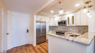 Welcome to this impeccably remodeled 1 Bed, 1.5 Bath Ocean Front