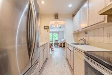 Pristinely maintained 2-bedroom, 1.5-bath duplex co-op in - photo 3