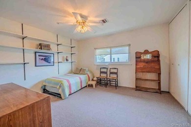 Pristinely maintained 2-bedroom, 1.5-bath duplex co-op in - photo 9
