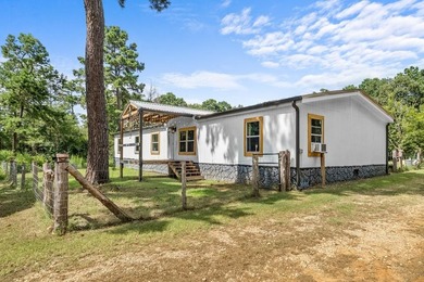 Tucked away among nearly 39 acres of towering timber, this East - photo 3