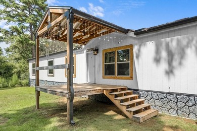 Tucked away among nearly 39 acres of towering timber, this East - photo 4