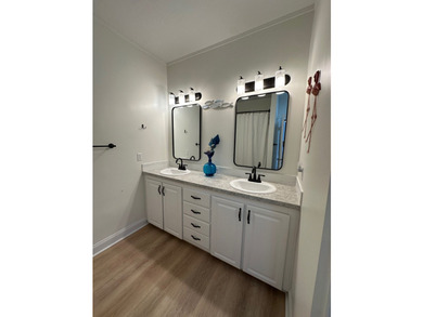 Experience comfort, convenience, and coastal proximity in this - photo 29