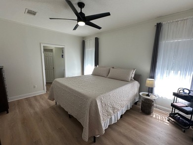 Experience comfort, convenience, and coastal proximity in this - photo 32